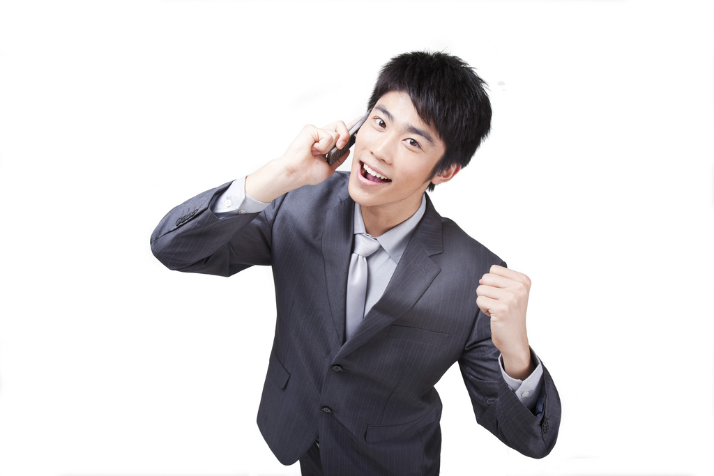 年轻的商务男士打手机图片