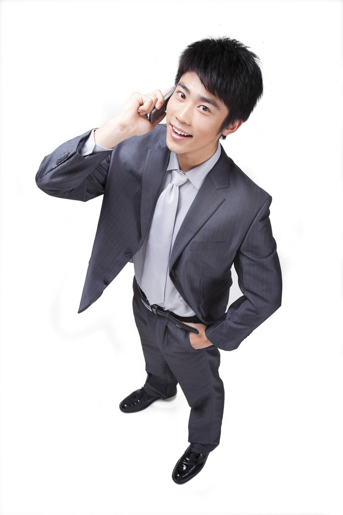 年轻的商务男士打手机图片