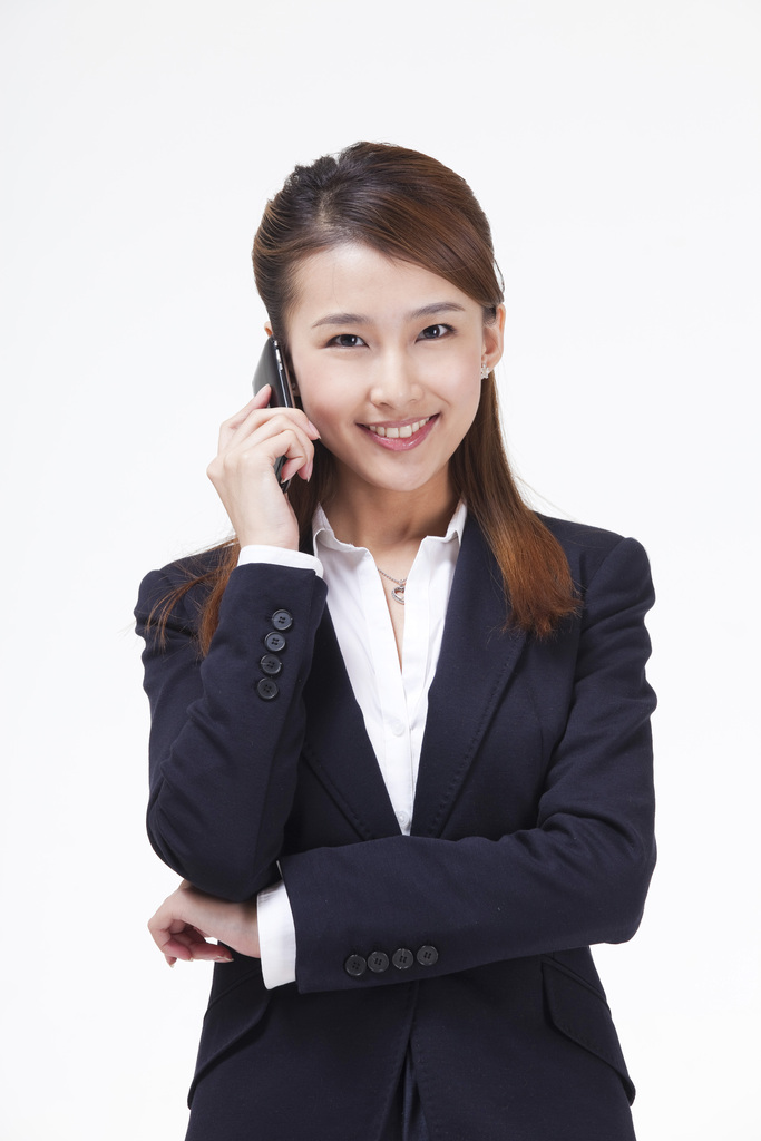 年轻的商务女士打手机图片