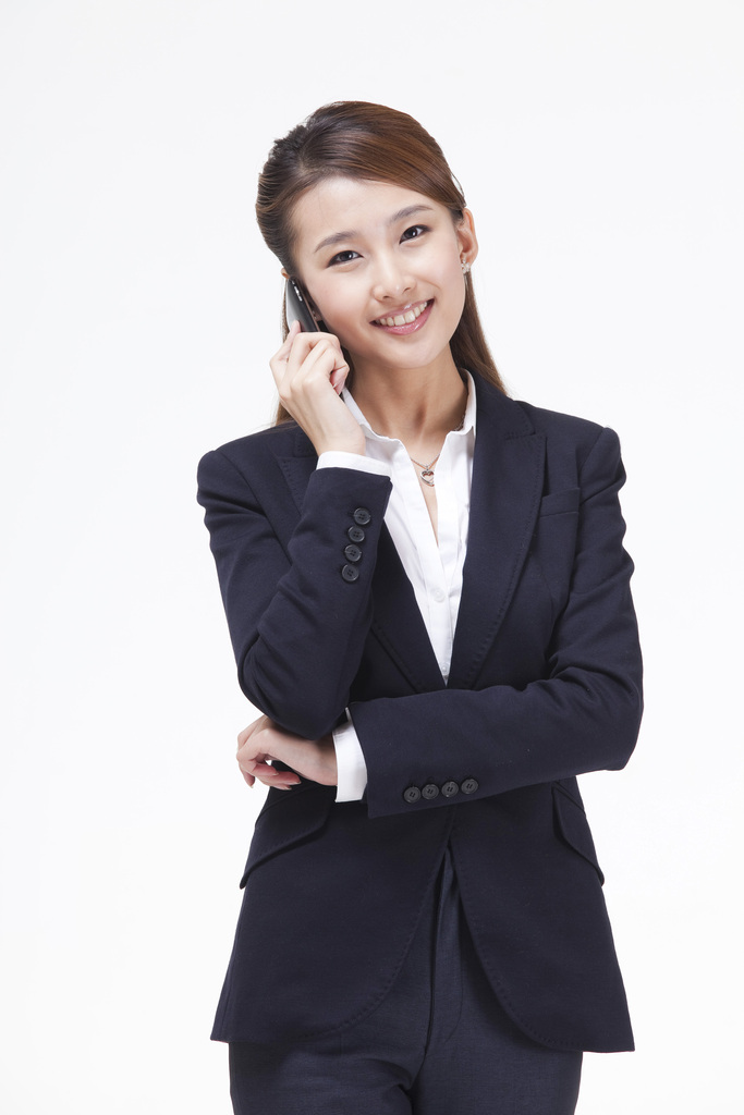 年轻的商务女士打手机图片