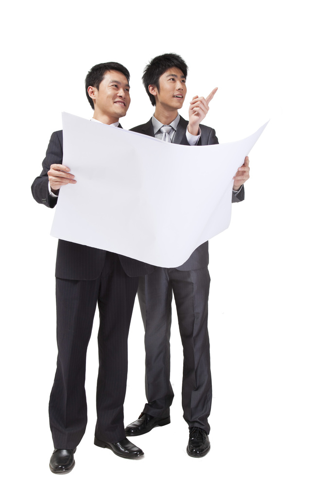 商务男设计师拿着建筑图纸
