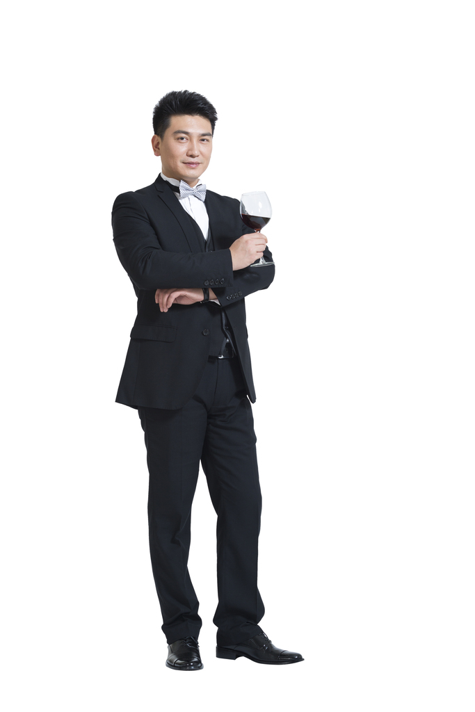 棚拍中年商务男士端酒杯图片