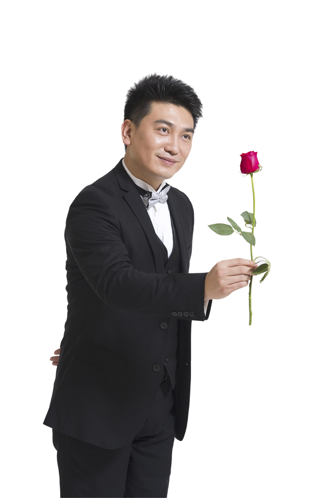 棚拍中年商务男士拿着一支玫瑰花