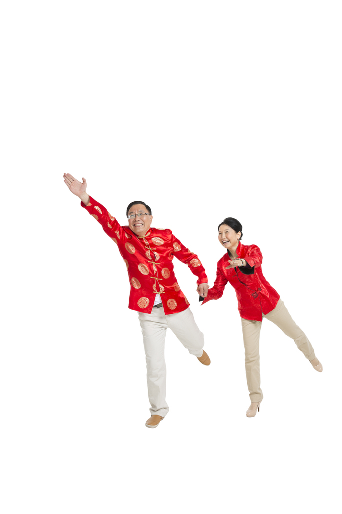 棚拍中国新年快乐的唐装老年夫妻图片