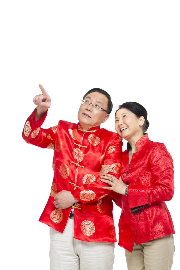 棚拍中国新年快乐的唐装老年夫妻聊天图片