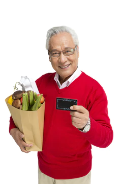 棚拍老年男人拿着银行卡超市购物图片