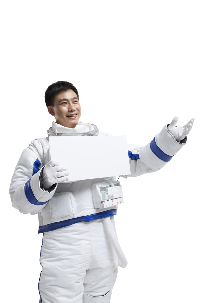 棚拍中年男宇航员拿着白板