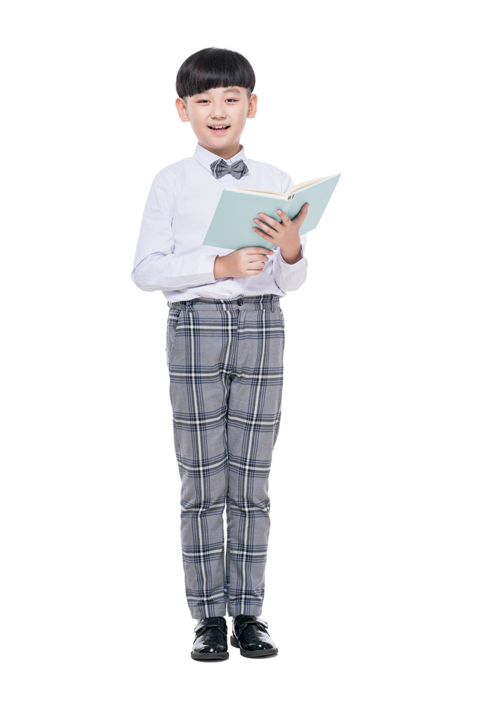 快乐的小学生手拿课本图片