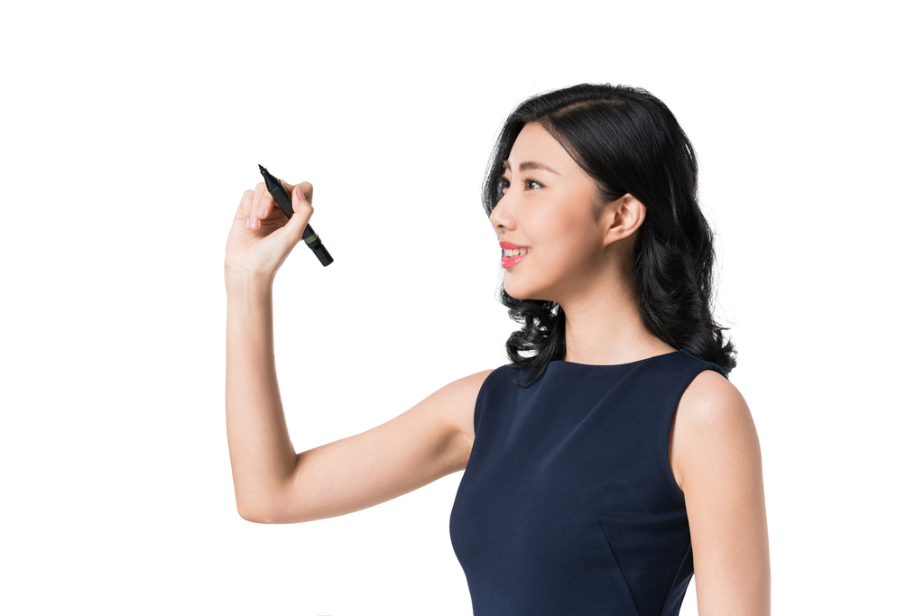 职业女性拿着笔图片