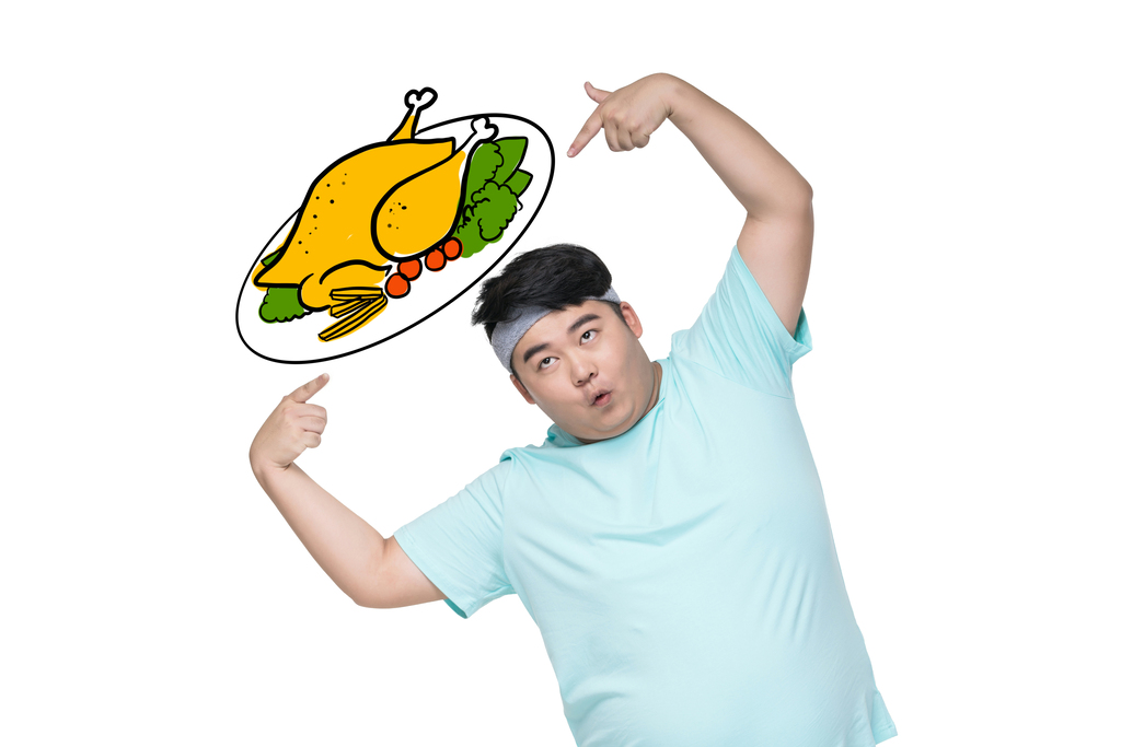 肥胖的青年男子在做运动图片